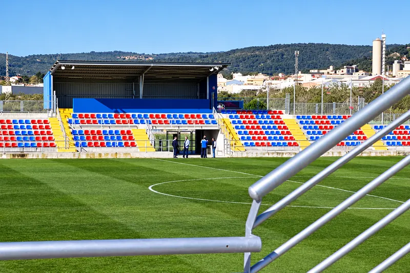 Covered stand at the mini-stadium with blue and claret seats