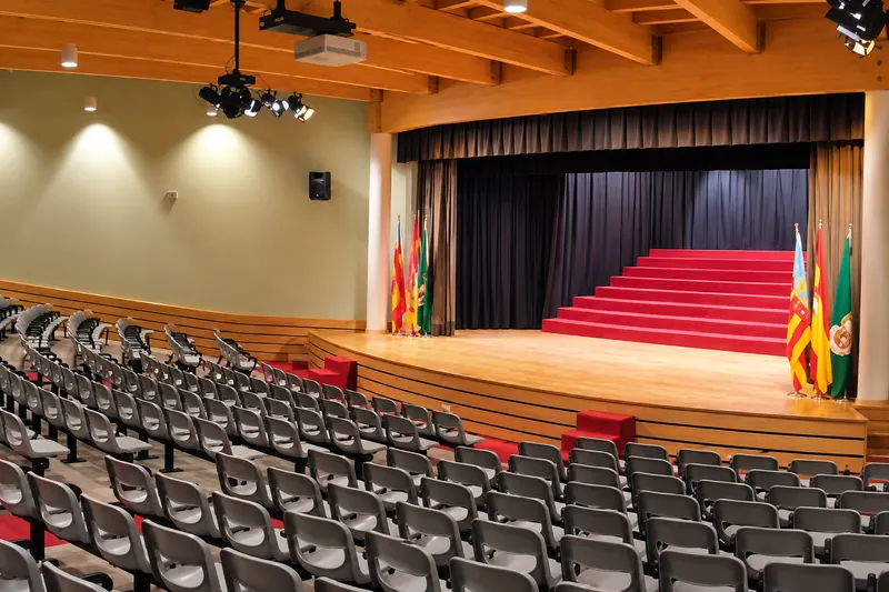 Auditorium with a stage and rows of seats
